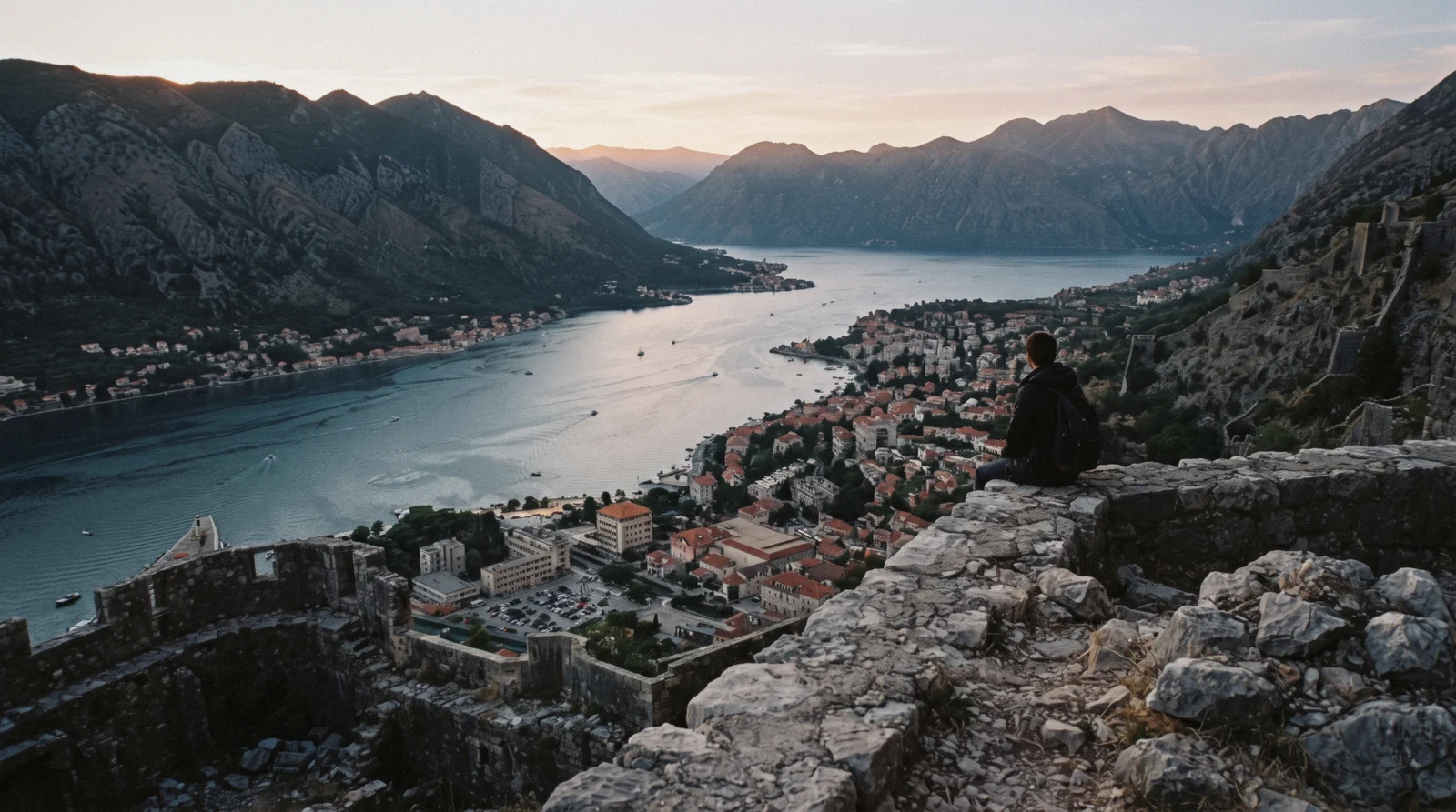 View over the tiled roofs of Kotor old town and the bay from the city walls above the town