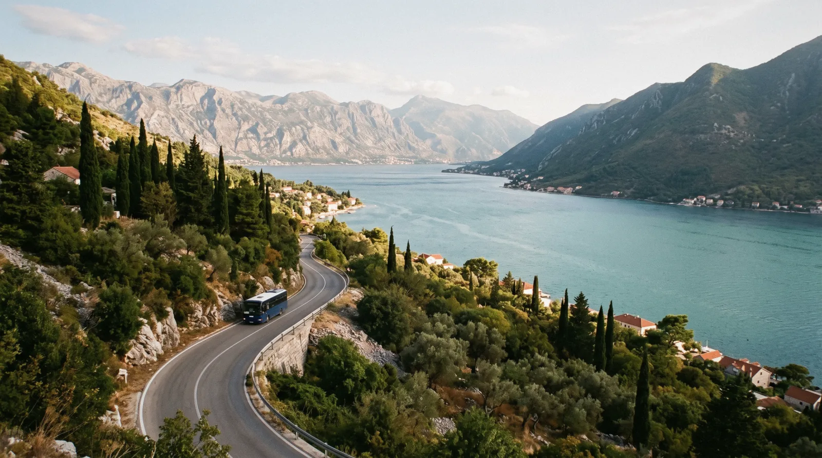 Boats and mountains on the Bay of Kotor seen from above Kotor old town